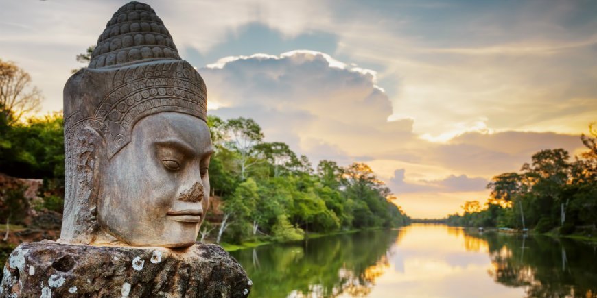 Statue by the southern entrance to Angkor Thom in Cambodia