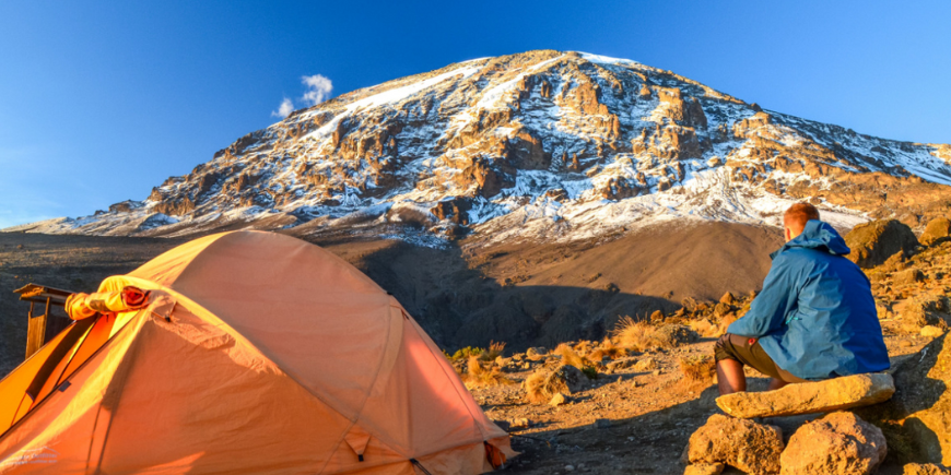 Man at camp on Kilimanjaro