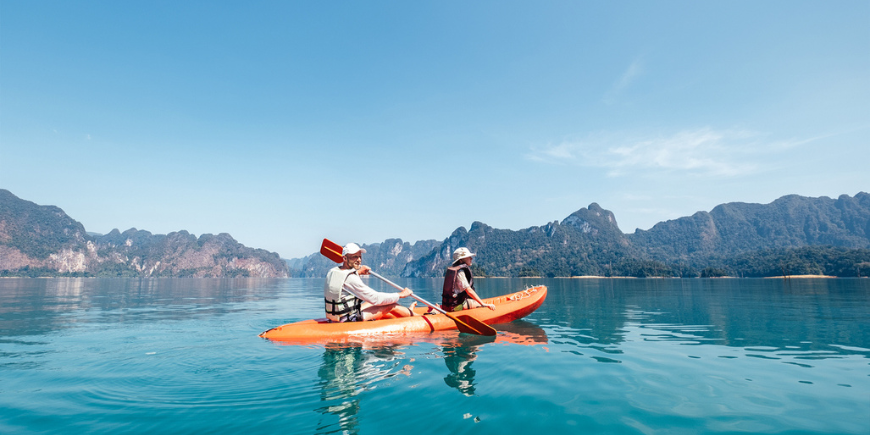 Two men canooing on Sok River