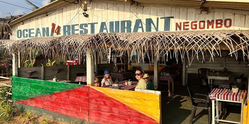 Family sitting at a restaurant in Negombo