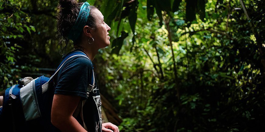 Women looking up in the jungle in Costa Rica