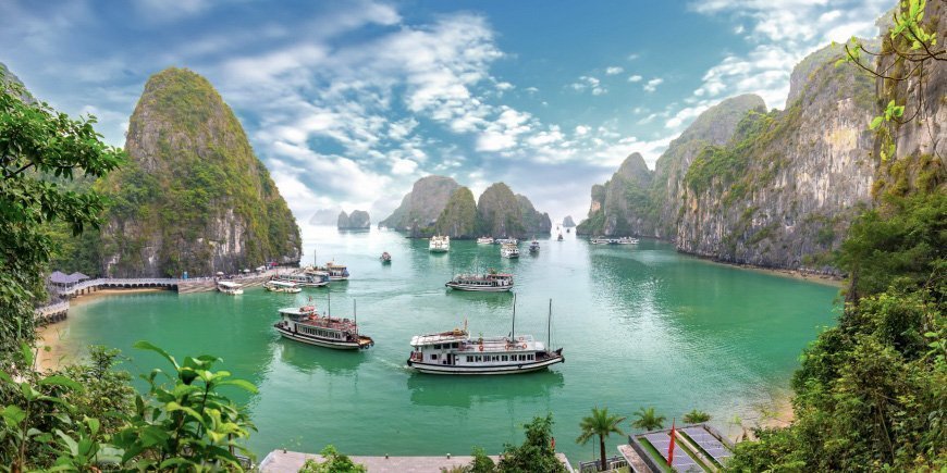 Small cruise ships sailing in Ha Long Bay