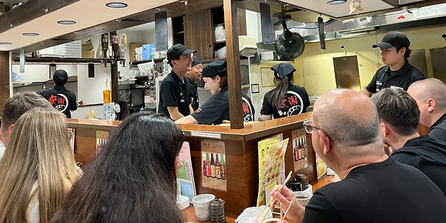 Small restaurant in Japan filled with people
