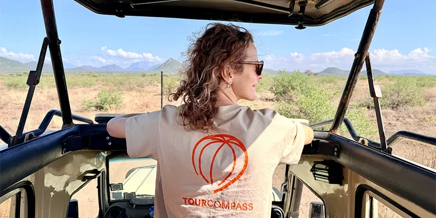 Woman wearing a TourCompass T-shirt on safari in Samburu in November