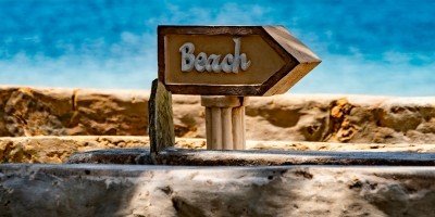 Sign on the beach at Diani Beach near Mombasa