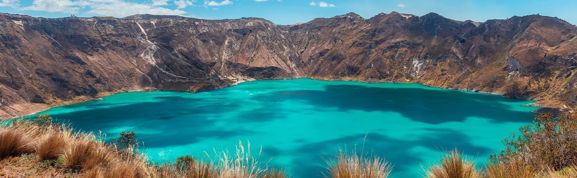 Quilotoa volcanic crater lake with turquoise waters