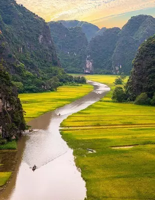 Amazing view of Tam Coc with karst formations, Ninh Binh Province, Vietnam River flow over the mountain