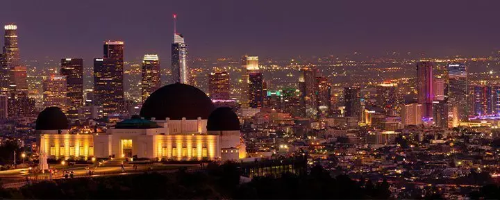Griffith Observatory in Los Angeles in the dark overlooking the city