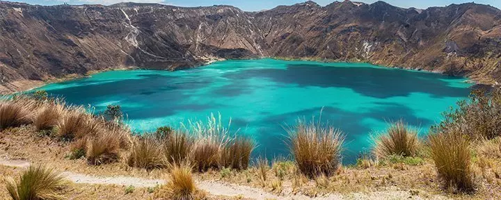 Quilotoa volcanic crater lake with turquoise waters