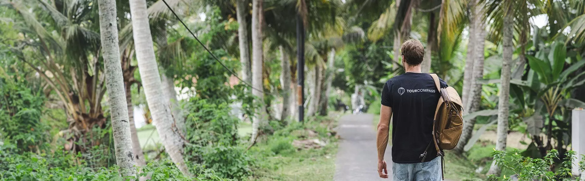 man wearing a TourCompass t-shirt on the island of Bali in Indonesia