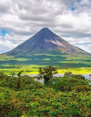 Scenic view of rainforest and cloud cover, Arenal Volcano, Costa Rica